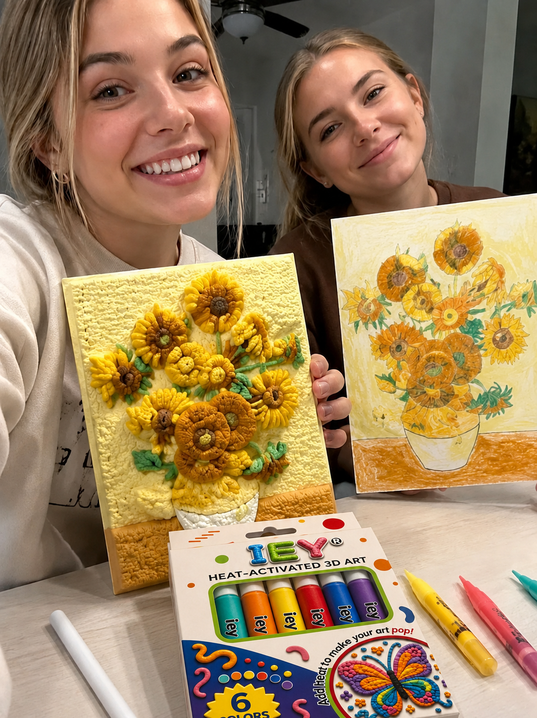 Sarah holding colorful raised flower artwork made with IEY pens